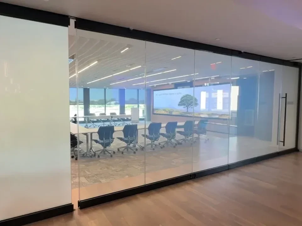 NanaWall folding glass wall with switchable smart film privacy