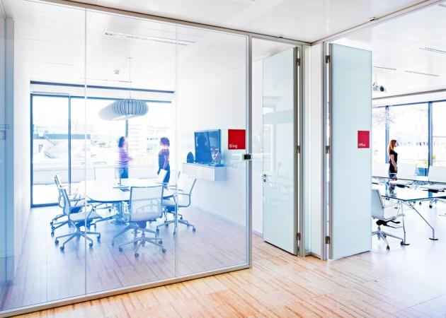Office with switchable smart glass partitions