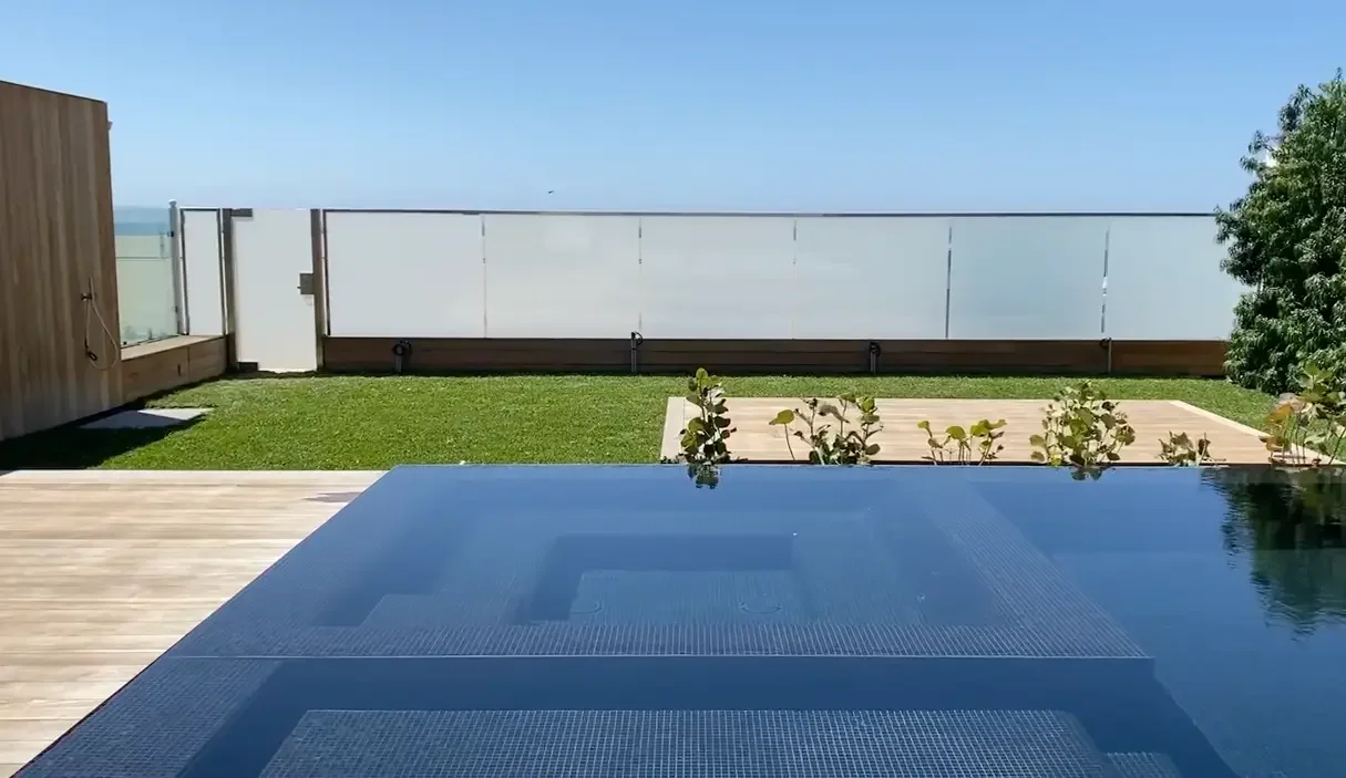 Oceanfront villa with a switchable smart glass fence