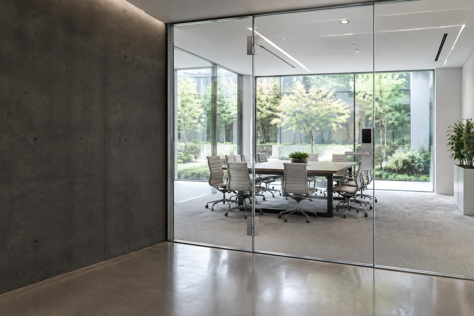 Illustrative commercial door with clear glass and smart lock